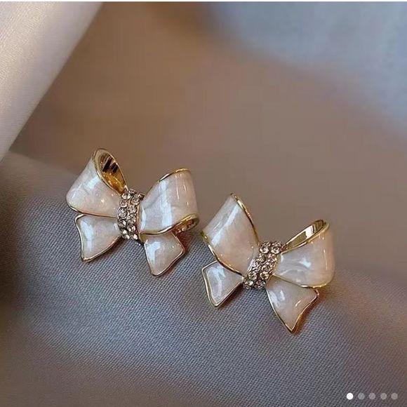 Jewelry - 🎀Ivory Swirl Gold Tone Sparkly Bowknot Post Back Stud Earrings💝